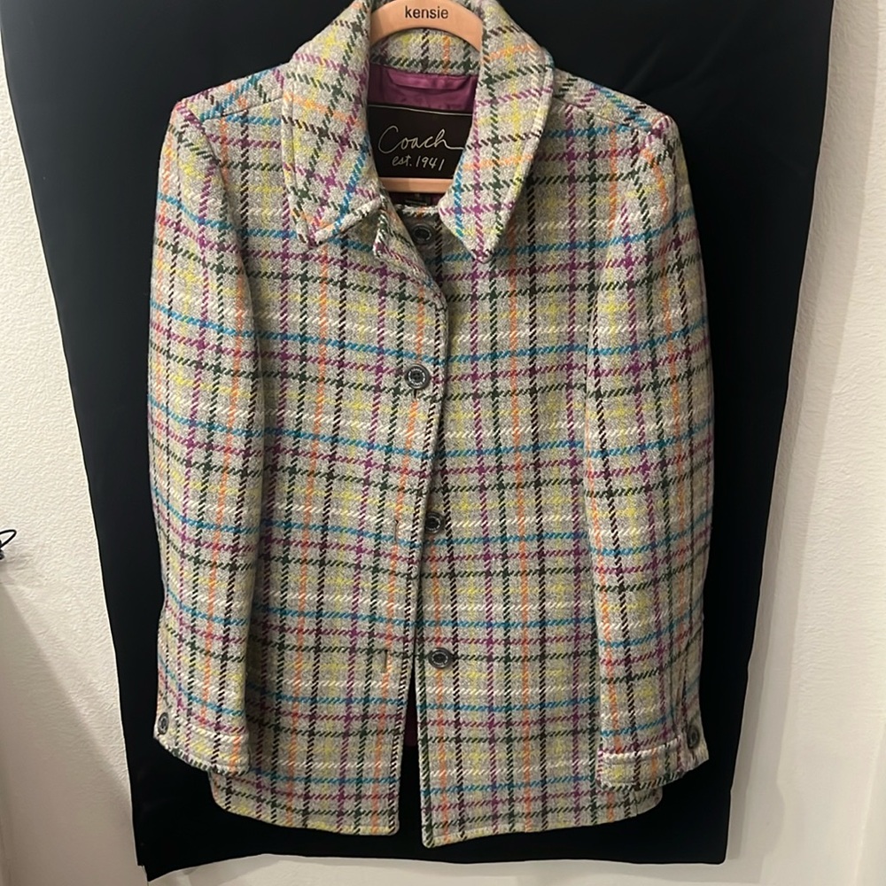Winter Coat by Coach in multi-colors,in medium size, no flaws like new